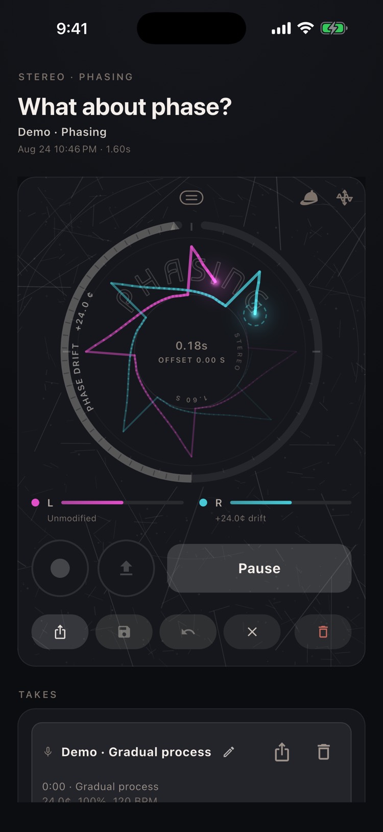 The phasing demo playing: two spiky rings, magenta and cyan, drifting on the wheel display